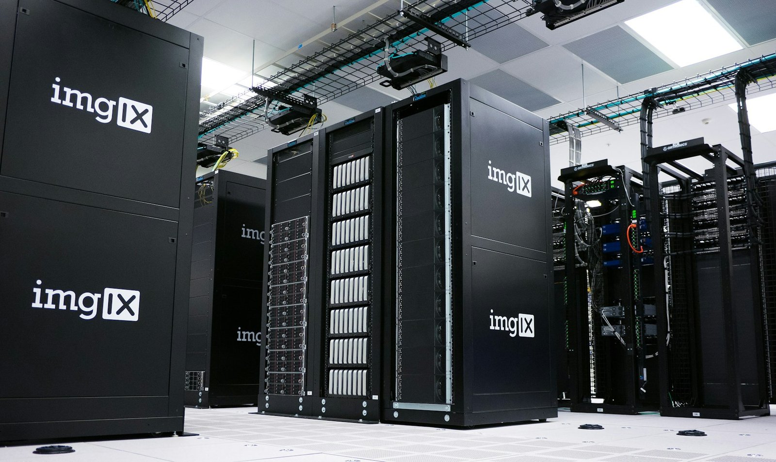 Rows of black server racks in a data centre